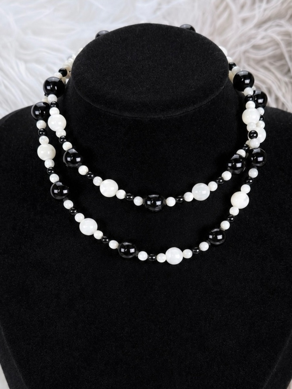 Vintage art deco flapper style mother of pearl and black beaded necklace